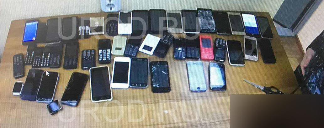 Объекты ФСИН атакуют свертками с десятками телефонов